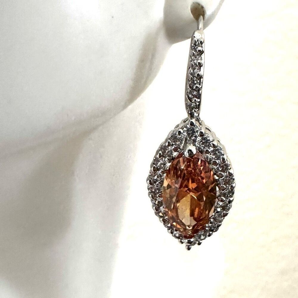 Orange rhinestone glamorous silver tone earrings